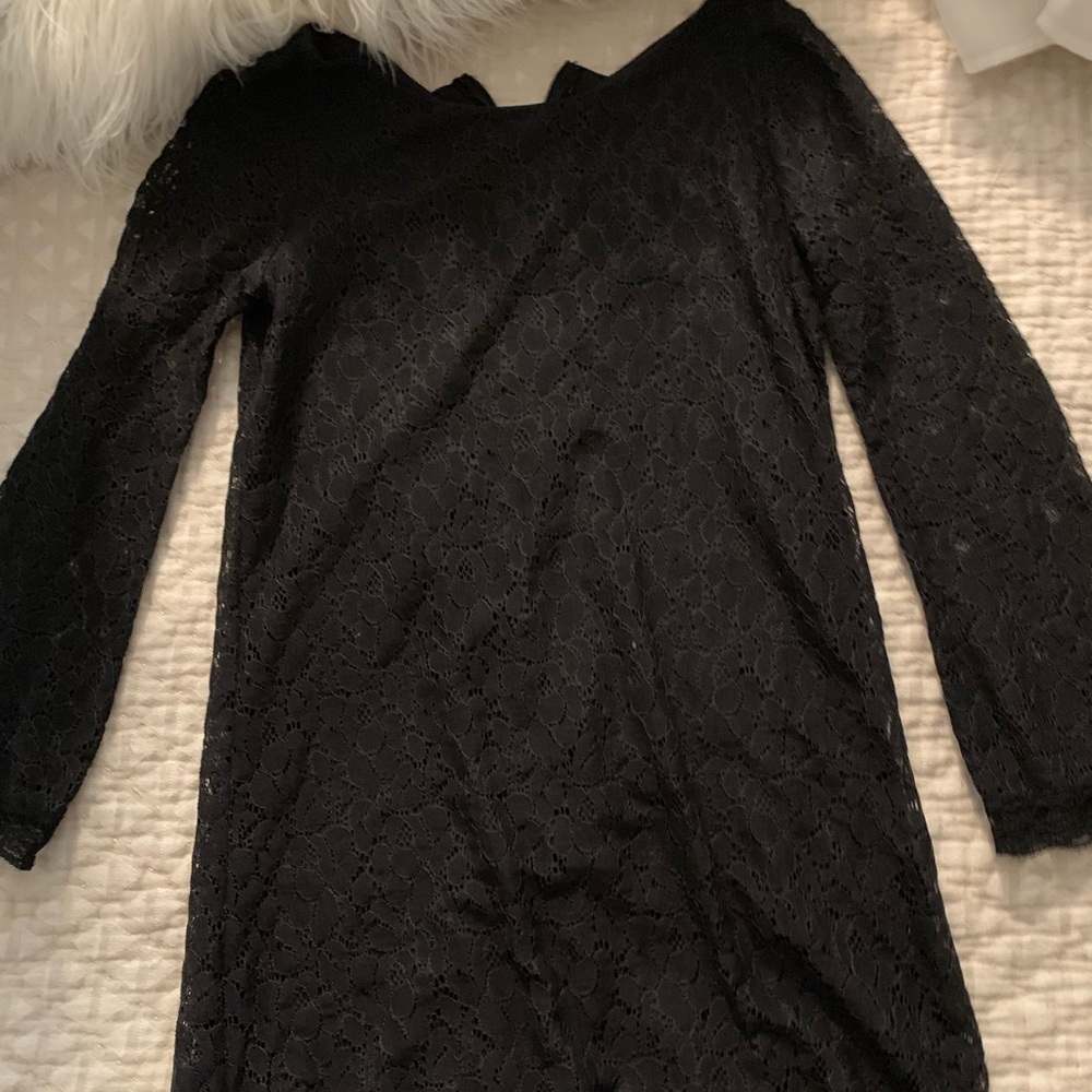 Small black above knee dress.